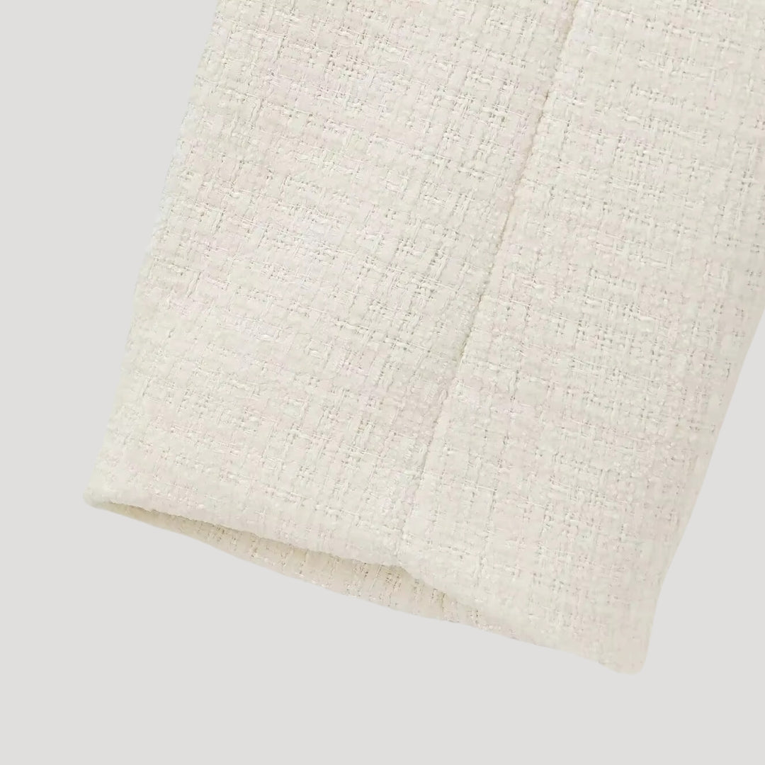 Sako z tkané látky s lukem vpředu – elegantní zkračený střih